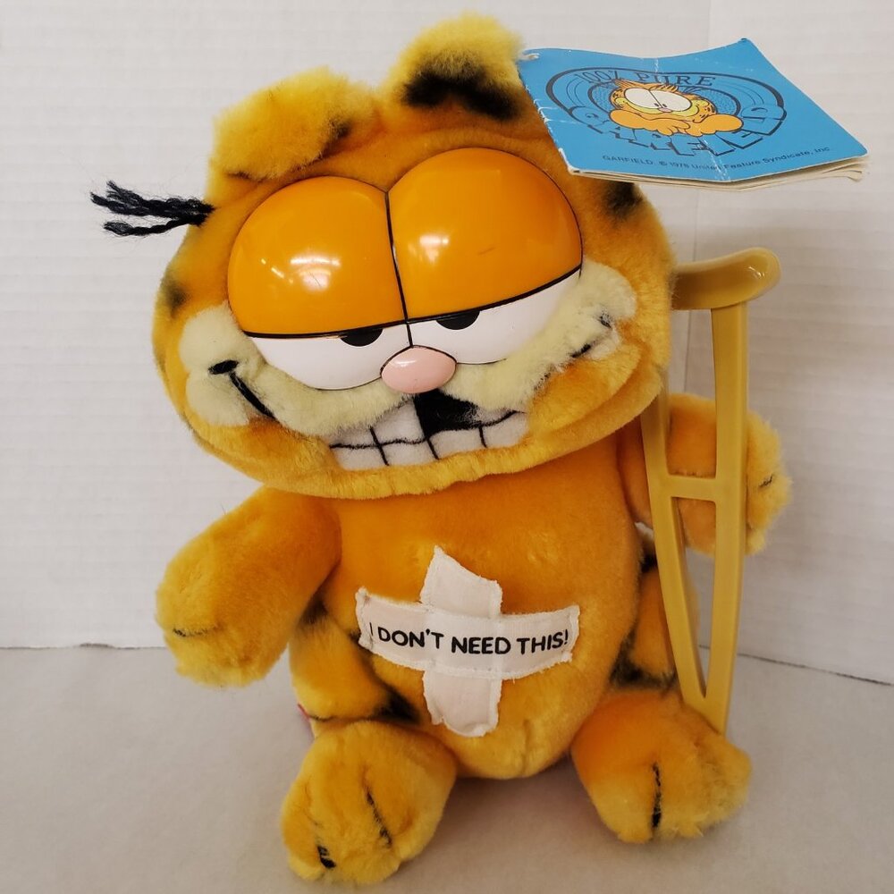 Vintage Plush Garfield with original tags crutch missing teeth Hockey Accident